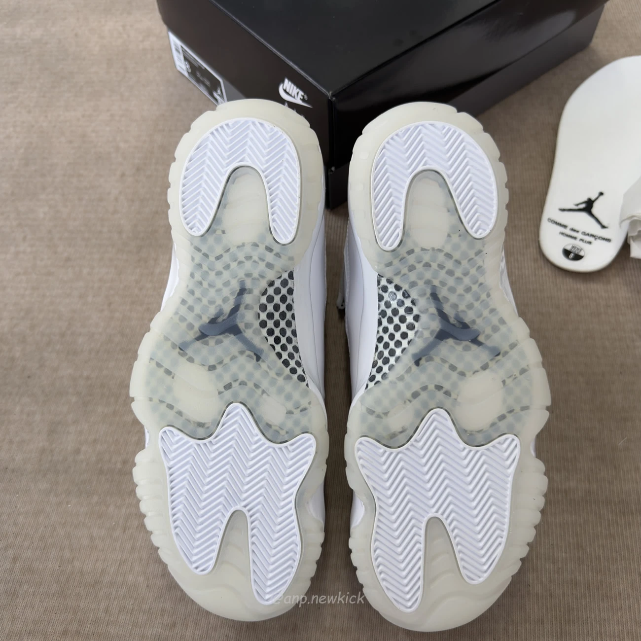 Air Jordan 11 Retro Comme des Garçons Homme Plus White IV7639-100