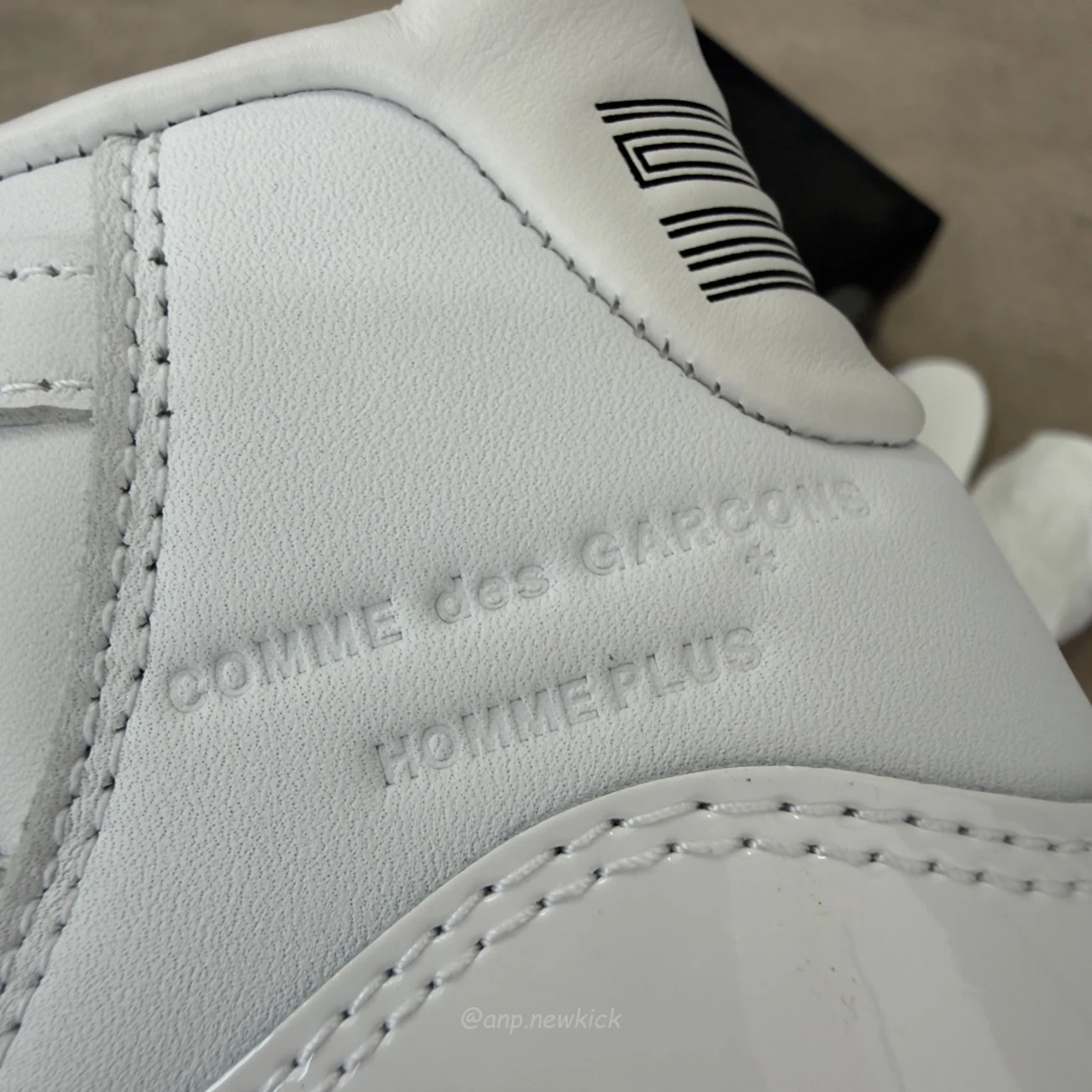 Air Jordan 11 Retro Comme des Garçons Homme Plus White IV7639-100